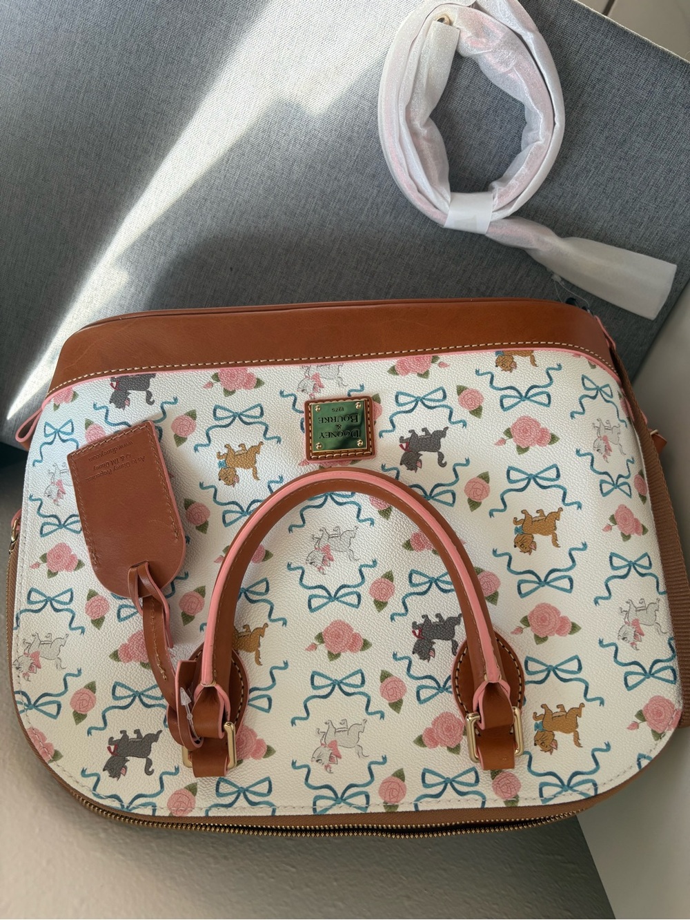 Dooney & Bourke White Satchel with Brown Trim and Pink Accents - Picture 3 of 4